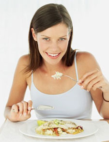Lady eating dinner