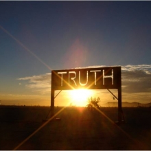 Truth sign in sunset